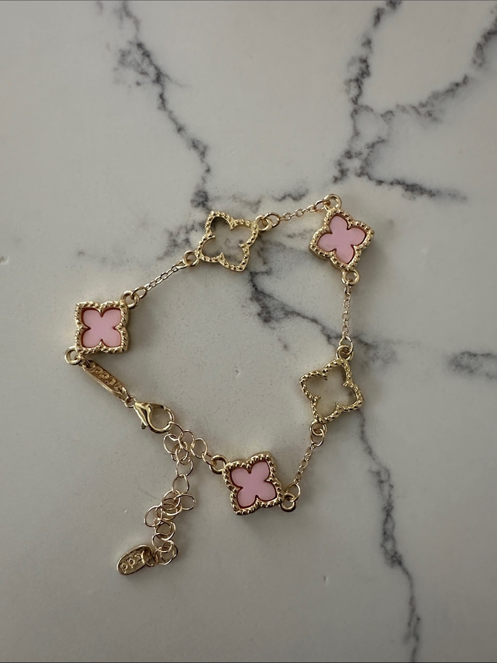 Affordable Fashion Finds Gold-Tone Bracelet with Pink Clover Motifs